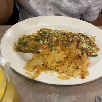 Jackson House - Western omelette; tomatoes, spinach and American cheese  Home potatoes - Diners Near Me - Jackson Heights, New York