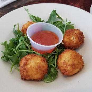 Station 400 - Fried goat cheese, I would recommend cutting these in 4ths and then spreading the sauce on each piece, it can be dry otherwise. - American Near Me - Sarasota, Florida Station 400 - Fried goat cheese, I would recommend cutting these in 4ths and then spreading the sauce on each piece, it can be dry otherwise. - American Near Me - Sarasota, Florida