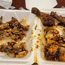 Dop’s Jerk House - Bones on the left side, meat on the right. Mixed jerk chicken.
