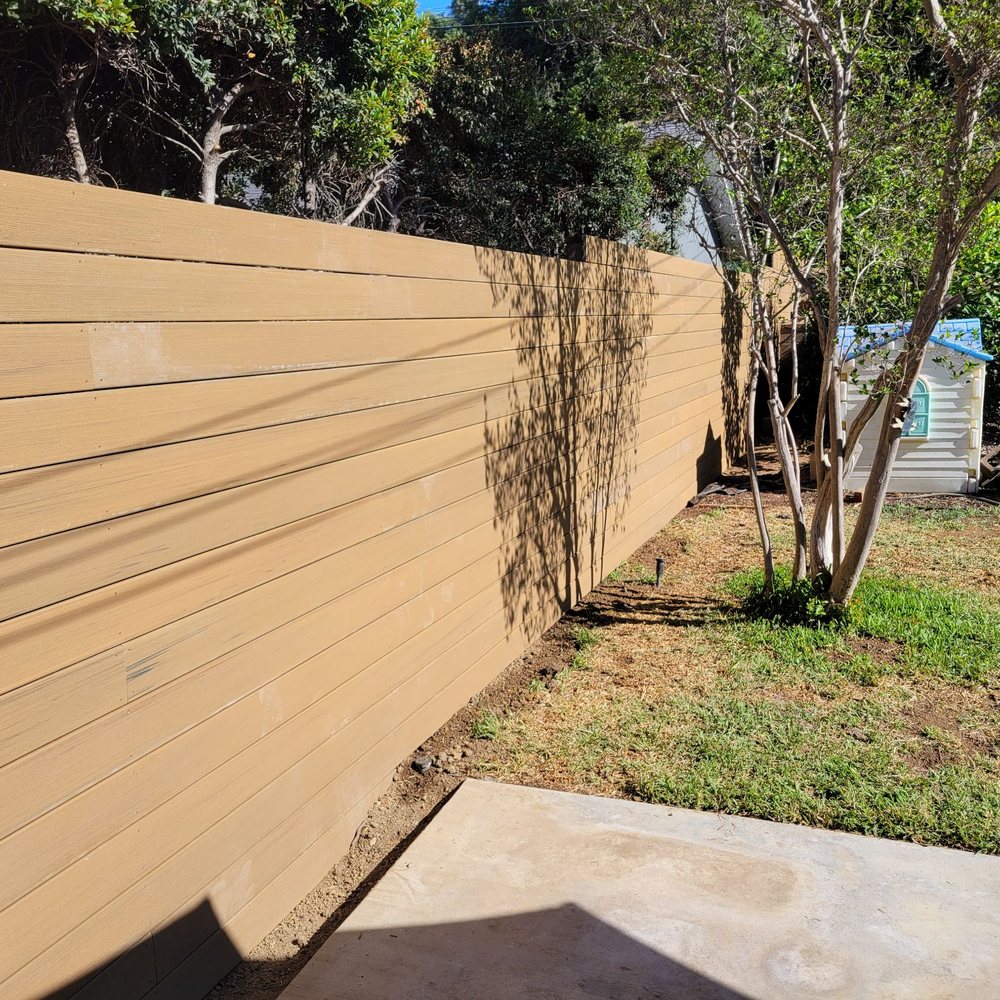 Our new fence made out of composite decking material. Our new fence made out of composite decking material.