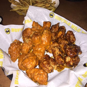 Buffalo Wild Wings - Boneless for tonight spicy garlic and tried something new the Caribbean jerk they were ehhhh alright. - American Near Me - Goodyear, Arizona