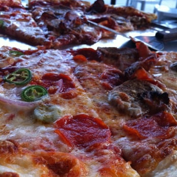 Sizzle Pie - Napalm Breath on left, Pig Destroyer on right - Pizza Near Me - Portland, Oregon Sizzle Pie - Napalm Breath on left, Pig Destroyer on right - Pizza Near Me - Portland, Oregon