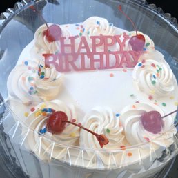 a birthday cake in a plastic container a birthday cake in a plastic container