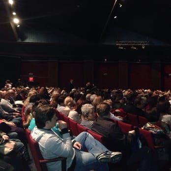 Master Theater - a large crowd of people sitting in red chairs - Performing Arts Near Me - Brooklyn, New York