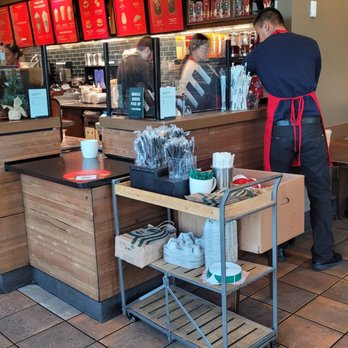 Starbucks - a man working in a coffee shop - Coffee & Tea Near Me - San Diego, California Starbucks - a man working in a coffee shop - Coffee & Tea Near Me - San Diego, California