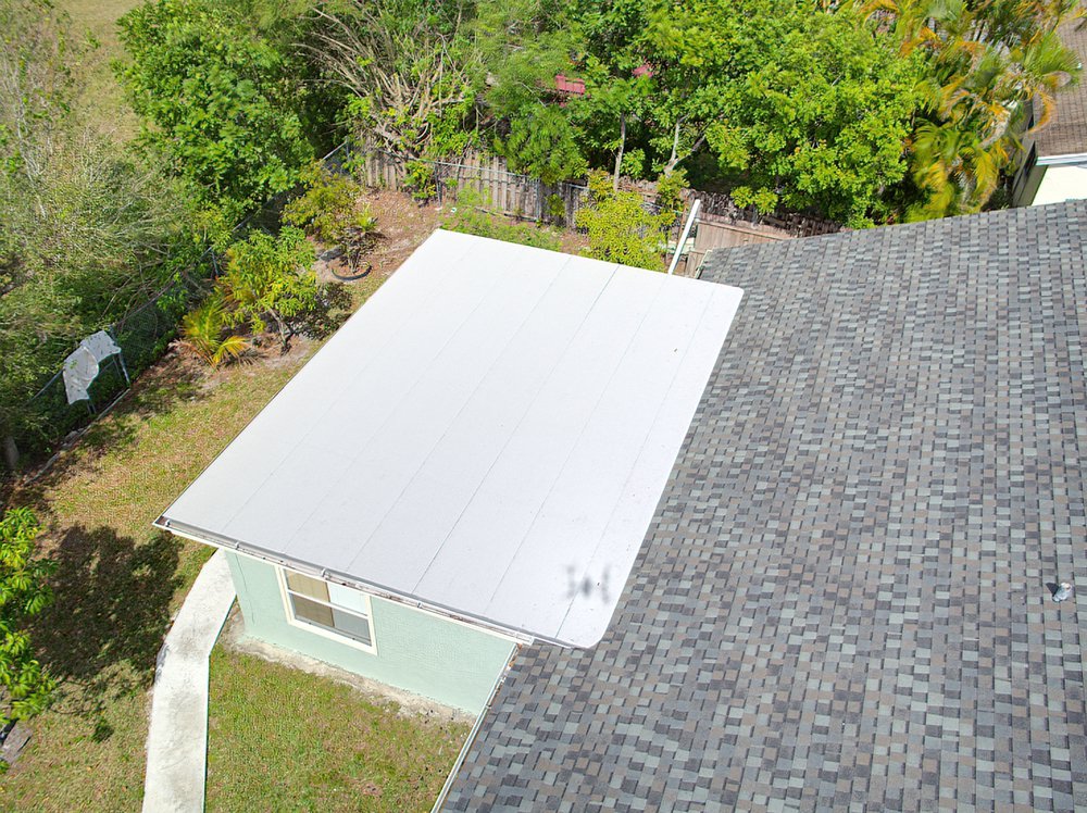 Slide of Louis Roofing