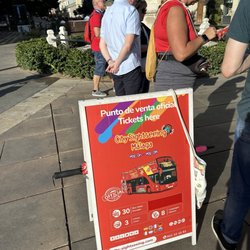 City Sightseeing Malaga Hop On Hop Off - Tbey have a sign so you know where to wait.