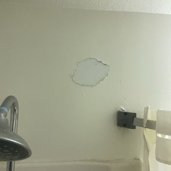 Sun Inn Lounge - Ripped piece of wall - Hotels Near Me - Rapid City, South Dakota Sun Inn Lounge - Ripped piece of wall - Hotels Near Me - Rapid City, South Dakota