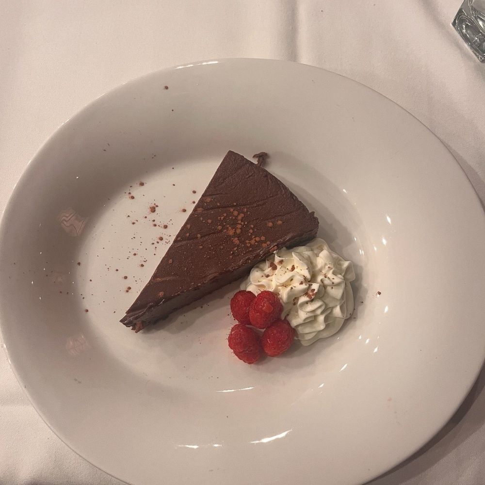 The Capital Grille - Flourless Expresso Chocolate Cake - Steakhouses Near Me - Louisville, Kentucky The Capital Grille - Flourless Expresso Chocolate Cake - Steakhouses Near Me - Louisville, Kentucky