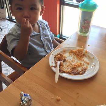 Carrillo's Mexican Food - My son was given this plate of beans and rice for free. He was also given that chocolate. Great service! - Mexican Near Me - Clovis, California