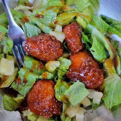Bearded Monkey Sports Bar & Grill - Spicy Mango Salad packed some heat, but way too sweet for my taste. The bits of pineapple did not add much to the romaine lettuce.