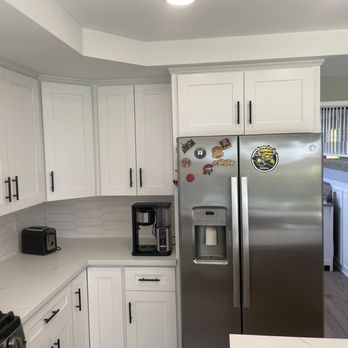 William H Finnegan Construction - a kitchen with stainless steel appliances - General Contractors Near Me William H Finnegan Construction - a kitchen with stainless steel appliances - General Contractors Near Me