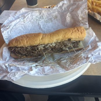 Those Guys Pies - Original cheesesteak with onions, mushrooms, and provolone. Sandwich is about 10" long. - Cheesesteaks Near Me - North Las Vegas, Nevada Those Guys Pies - Original cheesesteak with onions, mushrooms, and provolone. Sandwich is about 10" long. - Cheesesteaks Near Me - North Las Vegas, Nevada