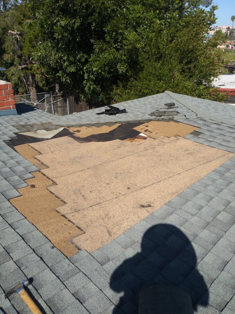 Slide of Father And Son Roofing.