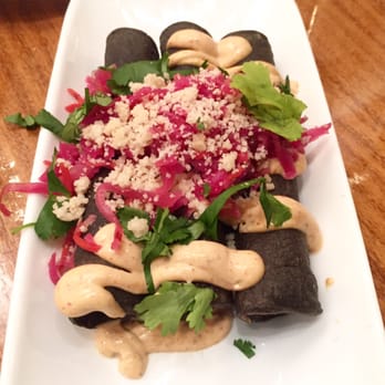 Seabirds Kitchen - Purple taquitos $7. Gluten free. purple potatoes, chipotle sour cream, fermented curtido, almond feta, cilantro. Love these. - Vegan Near Me - Costa Mesa, California