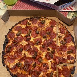Domino's Pizza - Got home with a burnt Pizza from Dominos.