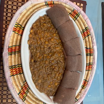 Uchenna - a plate of food on a table - Ethiopian Near Me - Colorado Springs, Colorado Uchenna - a plate of food on a table - Ethiopian Near Me - Colorado Springs, Colorado