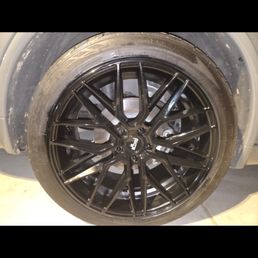 Over spray black paint on tire - never got taped off Over spray black paint on tire - never got taped off
