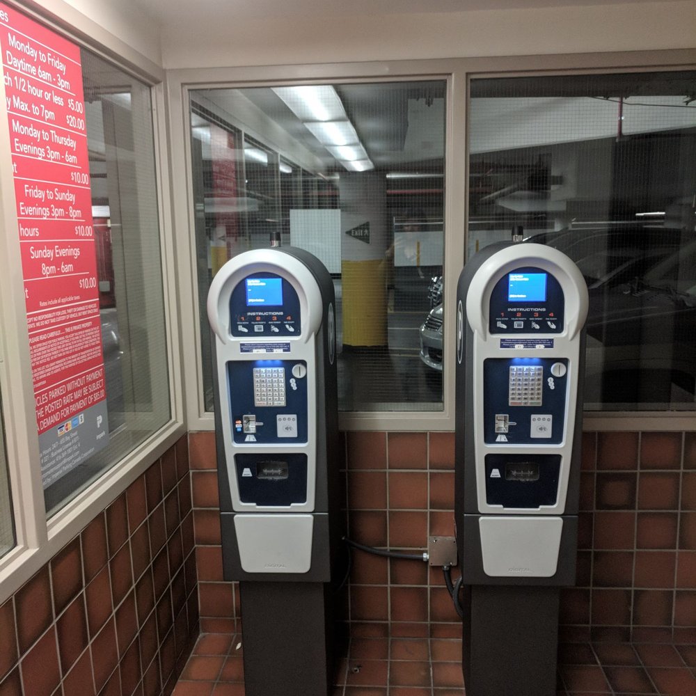 Impark - You need to pay first by registering your car's licence plate at a machine - Parking Near Me - Toronto, Ontario