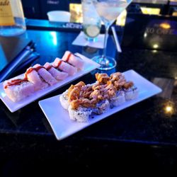 Rain Premier Sushi Bar & Lounge - The Cajun and Philly Popper with a Lychee Martini