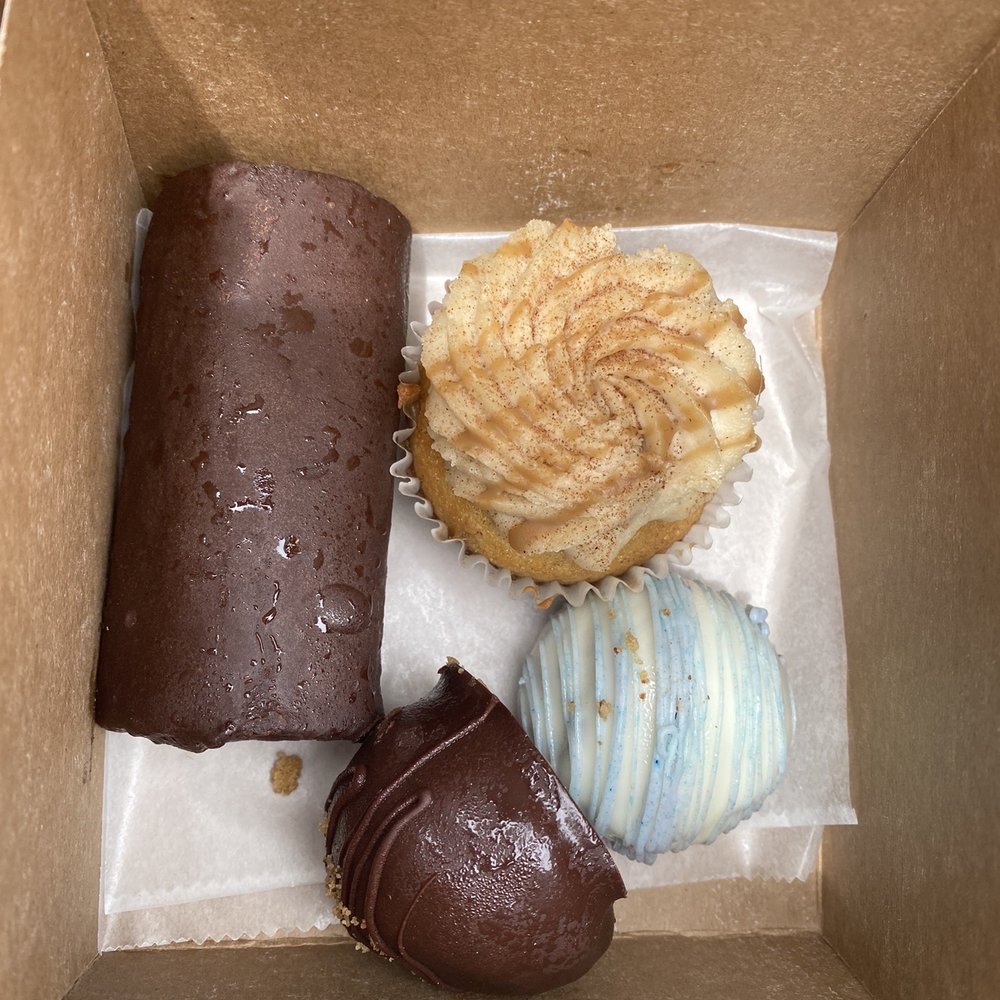 Papa Ganache - (Upper Left) Swiss Roll, (Upper Right)Tres Leches Cupcake, (Lower Left) Cookie Dough Truffle, (Lower Right) Ube Truffle. - Cupcakes Near Me - Cranford, New Jersey Papa Ganache - (Upper Left) Swiss Roll, (Upper Right)Tres Leches Cupcake, (Lower Left) Cookie Dough Truffle, (Lower Right) Ube Truffle. - Cupcakes Near Me - Cranford, New Jersey