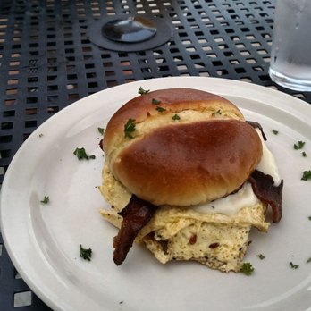 Over the Counter - Pesto breakfast sandwich with fried egg, bacon, and provolone. Delicious! - New American Near Me - Worthington, Ohio