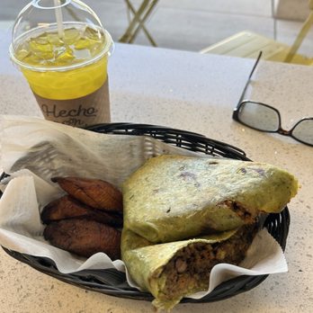 1928 Cuban Bistro - Ortega - The Wrap with Congri rice, black beans, ground beef. Delicious Passion Fruit Drink - Bakeries Near Me - Jacksonville, Florida 1928 Cuban Bistro - Ortega - The Wrap with Congri rice, black beans, ground beef. Delicious Passion Fruit Drink - Bakeries Near Me - Jacksonville, Florida