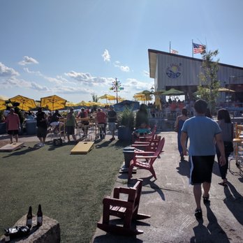 The Loading Dock Bar & Grill - Bags, bar, outside patio, lounging areas - American Near Me - Grafton, Illinois The Loading Dock Bar & Grill - Bags, bar, outside patio, lounging areas - American Near Me - Grafton, Illinois