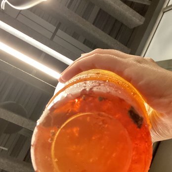 McDonald's - a person holding an orange drink - Fast Food Near Me - Brooklyn, New York McDonald's - a person holding an orange drink - Fast Food Near Me - Brooklyn, New York