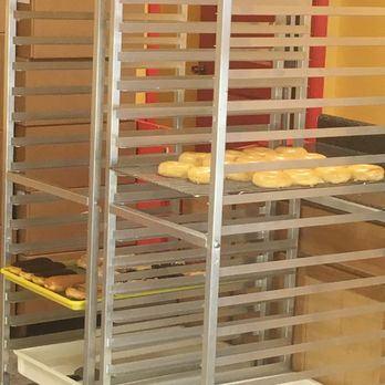 Oakland Donuts - racks of doughnuts in a bakery - Donuts Near Me - Oakland, Tennessee Oakland Donuts - racks of doughnuts in a bakery - Donuts Near Me - Oakland, Tennessee