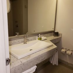 Presidente Intercontinental - Bathroom sink... not pictured is the toilet, placed in front of the shower door..  weird placement!