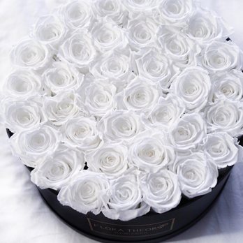 Flora Theory - LARGE BLACK BOX WITH REAL ROSES THAT LAST A YEAR
This flower box contains 40 stems of white preserved roses that last up to one year. - Florists Near Me Flora Theory - LARGE BLACK BOX WITH REAL ROSES THAT LAST A YEAR
This flower box contains 40 stems of white preserved roses that last up to one year. - Florists Near Me