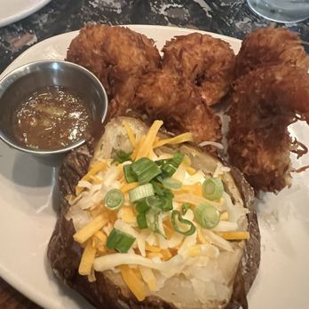 Outback Steakhouse - Coconut shrimp and baked potato - Steakhouses Near Me - San Marcos, Texas Outback Steakhouse - Coconut shrimp and baked potato - Steakhouses Near Me - San Marcos, Texas