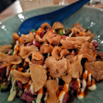 Lola's - Beef + Barley Tartare- Broccolini, gochujang, and sunchoke chips. $28. Perhaps a bit salty but tasty mix and good textures - New American Near Me - New York, New York