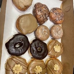 a variety of donuts in a box