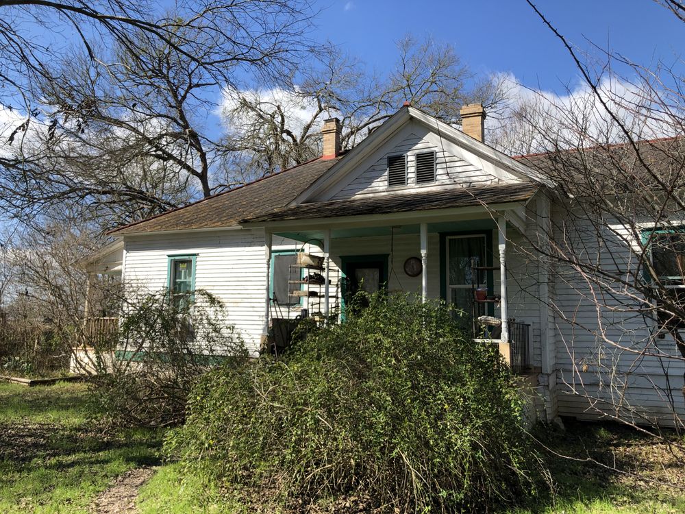 Slide of Revolutionary Roofing & Restoration