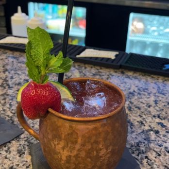 Henry's Place - a moscow mule with strawberries and mint - Cocktail Bars Near Me - Okemos, Michigan Henry's Place - a moscow mule with strawberries and mint - Cocktail Bars Near Me - Okemos, Michigan