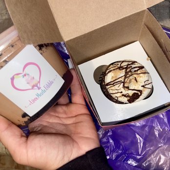 Love Made Edible - a hand holding a cup of coffee and a doughnut - Cupcakes Near Me - Brentwood, Pennsylvania Love Made Edible - a hand holding a cup of coffee and a doughnut - Cupcakes Near Me - Brentwood, Pennsylvania