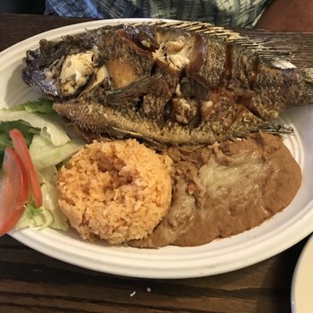 Guadalajaras Restaurant - Fried whole fish. It was tilapia though menu shows red snapper. It was delicious! Came with beans, rice & salad - Mexican Near Me - El Centro, California