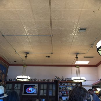 Rutabegorz - Inside. Lightning and coffee & tea pots. I had the water. (: - Vegetarian Near Me - Tustin, California Rutabegorz - Inside. Lightning and coffee & tea pots. I had the water. (: - Vegetarian Near Me - Tustin, California