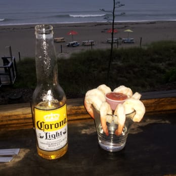 Sand On the Beach - View from 2nd floor with shrimp cocktail appetizer and a Corona. - American Near Me - Melbourne Beach, Florida Sand On the Beach - View from 2nd floor with shrimp cocktail appetizer and a Corona. - American Near Me - Melbourne Beach, Florida