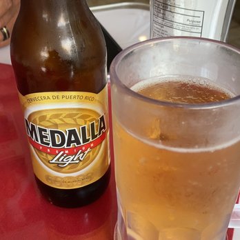 Isla Del Encanto - Medalla beer - Puerto Rican Near Me - Miami, Florida Isla Del Encanto - Medalla beer - Puerto Rican Near Me - Miami, Florida