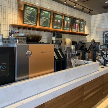 Starbucks - a coffee shop counter with coffee machines - Coffee & Tea Near Me - New Philadelphia, Ohio Starbucks - a coffee shop counter with coffee machines - Coffee & Tea Near Me - New Philadelphia, Ohio
