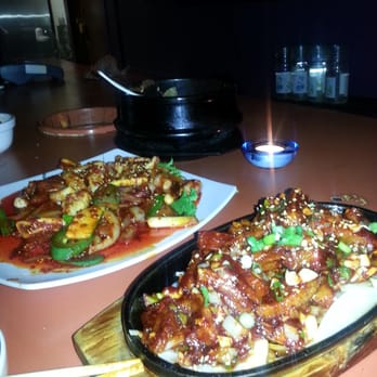 Dancen - Spicy pork skin, spicy squid, and pork and tofu kimchi soup in the back - Korean Near Me - Chicago, Illinois