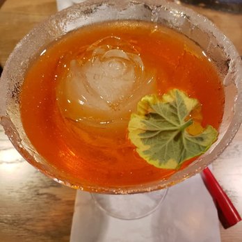 Peace & Saint - Floral cocktail with a beautiful rose ice cube - Hookah Bars Near Me - Raleigh, North Carolina