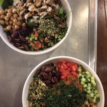 YAFO Kitchen - Top - salad bowl with chicken Bottom - Makkaresh lamb bowl with couscous - Middle Eastern Near Me - Charlotte, North Carolina YAFO Kitchen - Top - salad bowl with chicken Bottom - Makkaresh lamb bowl with couscous - Middle Eastern Near Me - Charlotte, North Carolina