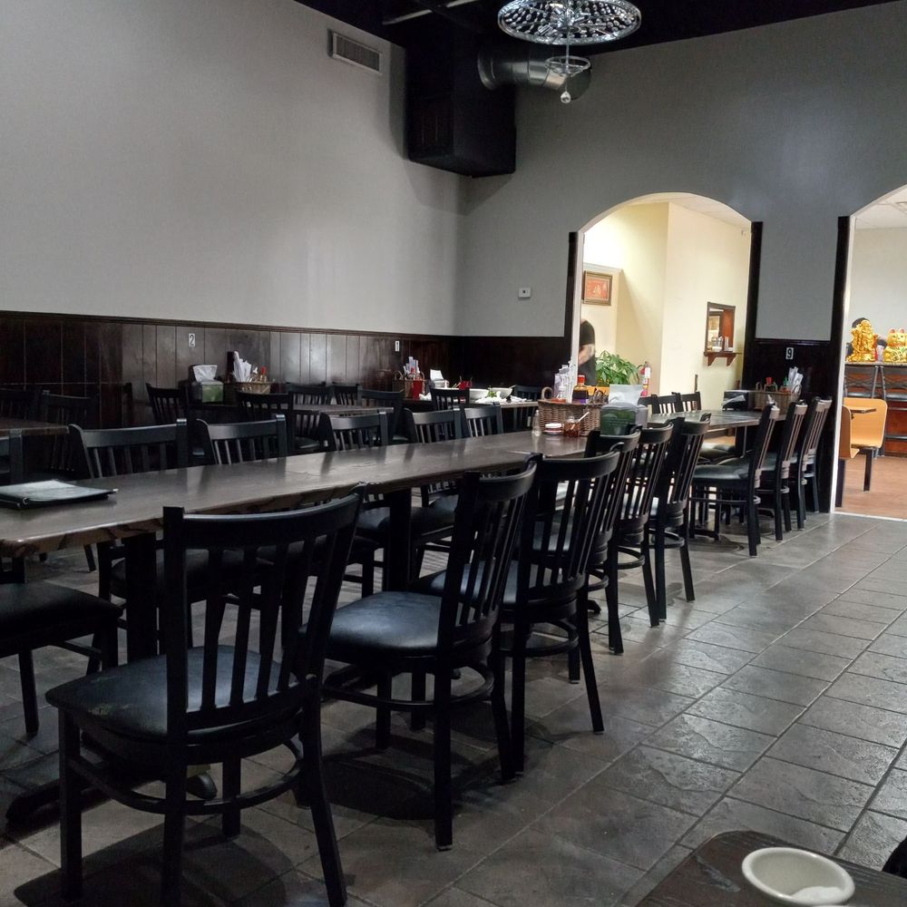 Pho House - a dining room with tables and chairs - Vietnamese Near Me - Memphis, Tennessee Pho House - a dining room with tables and chairs - Vietnamese Near Me - Memphis, Tennessee