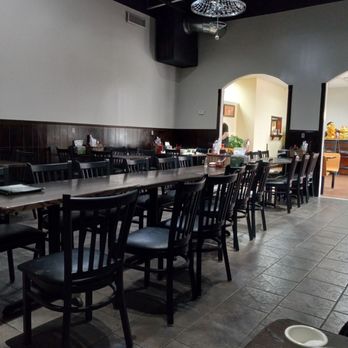 Pho House - a dining room with tables and chairs - Vietnamese Near Me - Memphis, Tennessee Pho House - a dining room with tables and chairs - Vietnamese Near Me - Memphis, Tennessee