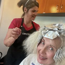 Lori at Shear Results Hair Salon - Multiple processes to fix color correct my bleached fried brassy Afro & amazing cut/layering natural spiral curls; which came back to life!