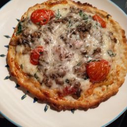 Outpost's fire roasted tomato and mushroom wheat free take and bake pizza!!! It's soooo good!!!! Outpost's fire roasted tomato and mushroom wheat free take and bake pizza!!! It's soooo good!!!!